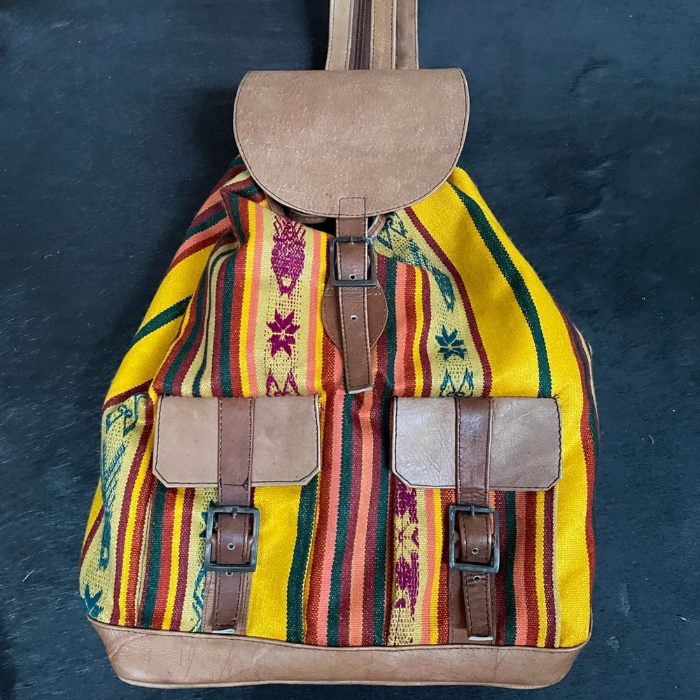 Ethnic boho design leather & canvas backpack, can convert to a shoulder bag
